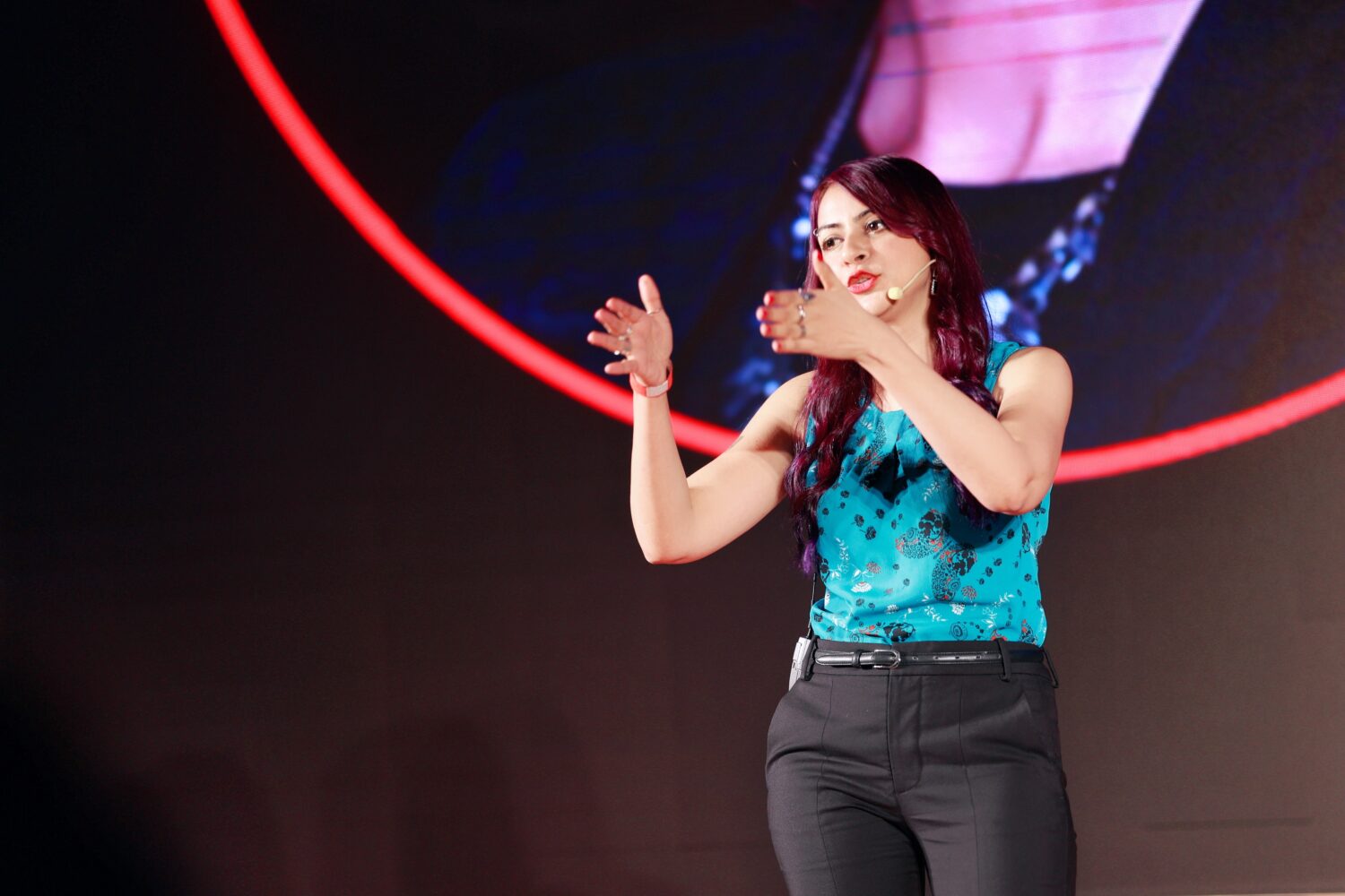 Nausheen Chen focusing on her talk on the TEDx stage in China