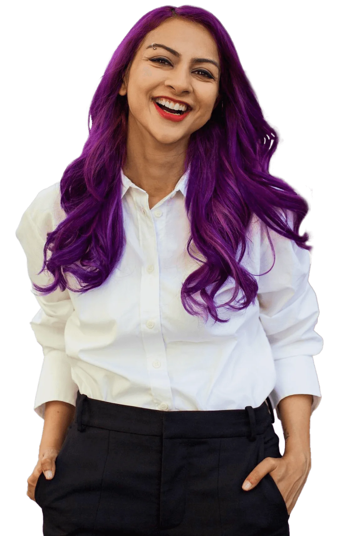 Nausheen I. Chen smiling with hands in her pockets