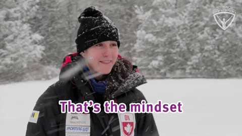 woman in snow talking about mindset of a champion