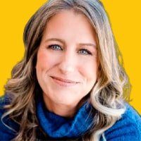 Ilona smiling on yellow background