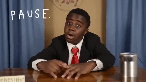 Speaking in Public: How to Use the Power of the Pause for Memorable Talks 6 A boy in suit talking about pause, breathe and love.